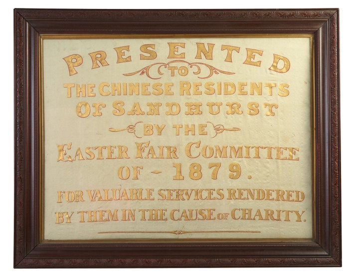 Framed award in gilt lettering, titled, 'Presented to the Chinese Residents'.