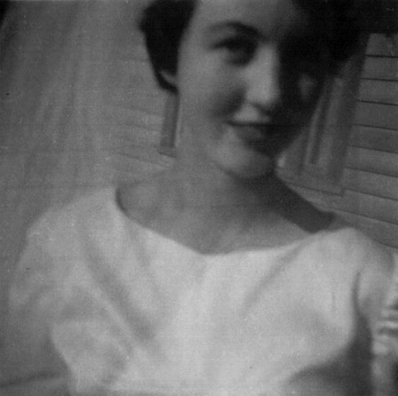 Black and white close-up photograph of a bride.