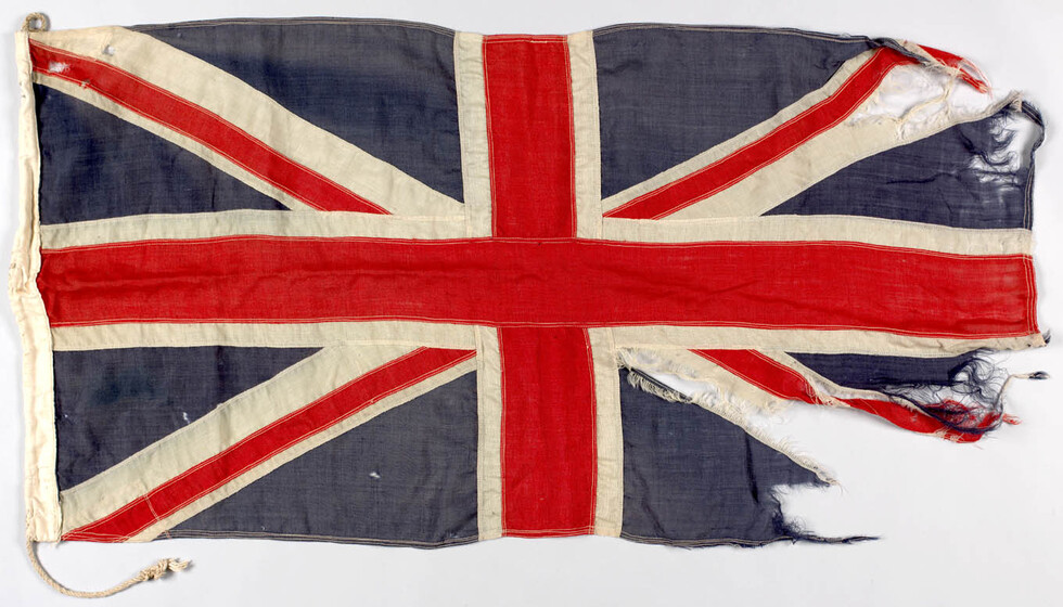 Tattered Union Jack flag.