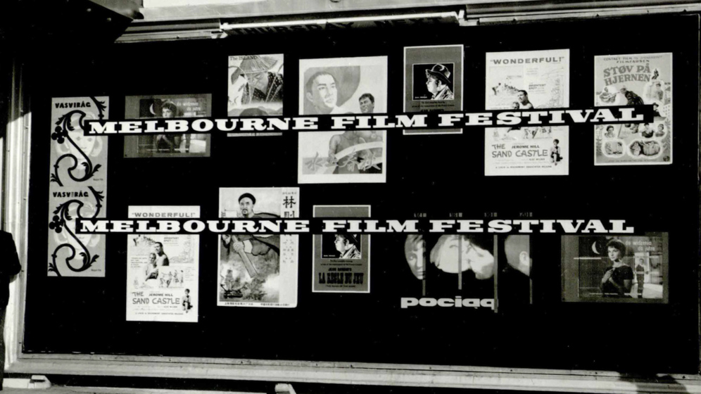 Black and white photograph of a display of film posters with the title, 'Melbourne Film Festival'.