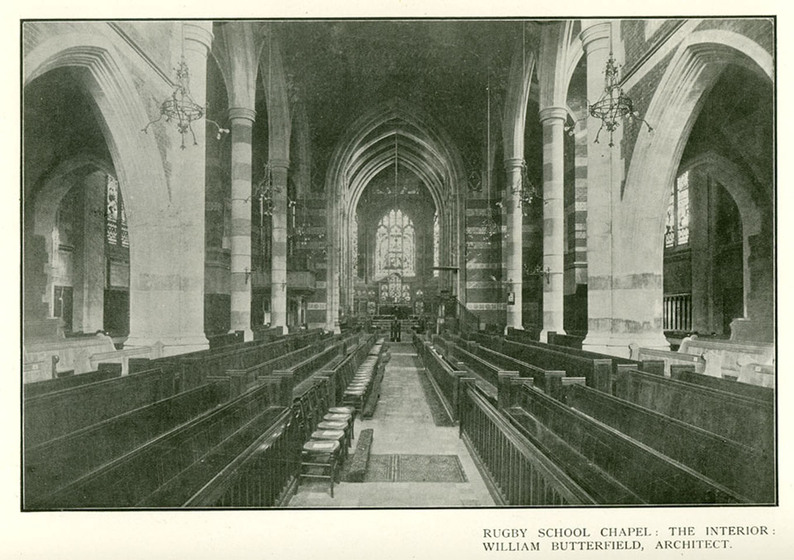 Black and white picture from a magazine looking along the nave of a Gothic Revival church.