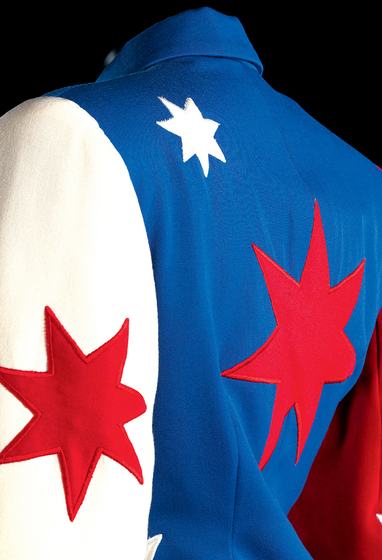 Mannequin wearing blue cotton double-breasted jacket with Australian Flag motif.