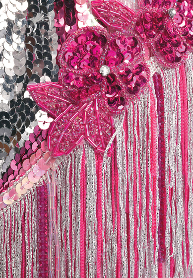 Detailing of the pink, silver and white sequin, bugle bead and fringe, including sequined flowers.