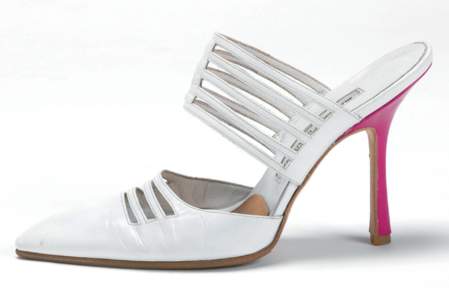 White leather high heel with cut outs in the toe and strap, and a pink stiletto heel.