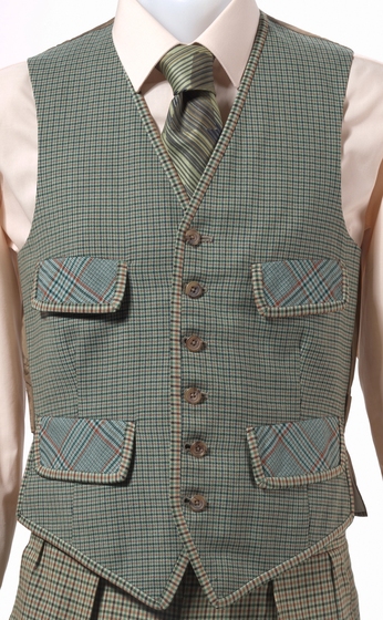 Checkered wool waistcoat with four pockets and buttoned down the front. Underneath is a peach long sleeve shirt and a striped tie. 