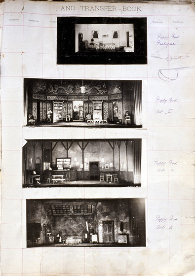 Four black and white photographs of different set designs, stuck to a scrapbook page. There are some hand written notes in the margin.