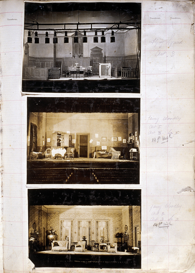 Three sepia photographs of different set designs, stuck to a scrapbook page. There are some hand written notes in the margin.
