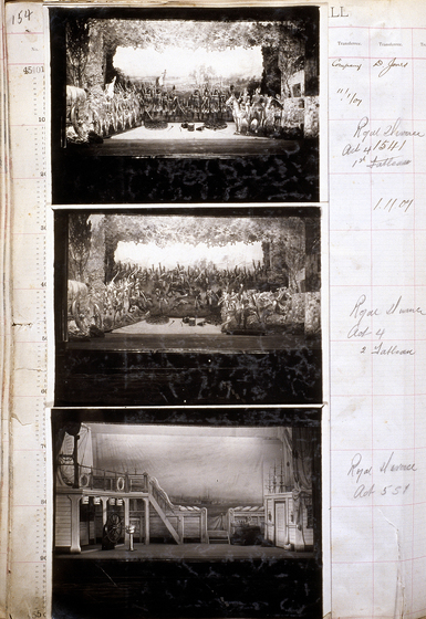 Three black and white photographs of different set designs, stuck to a scrapbook page. There are some hand written notes in the margin.