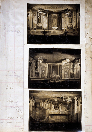 Three sepia photographs of different set designs, stuck to a scrapbook page. There are some hand written notes in the margin.