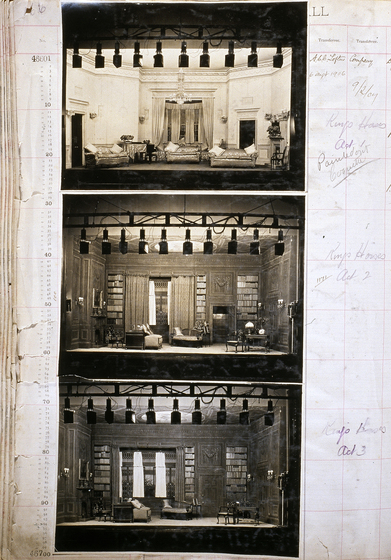 Three sepia photographs of different set designs, stuck to a scrapbook page. There are some hand written notes in the margin.
