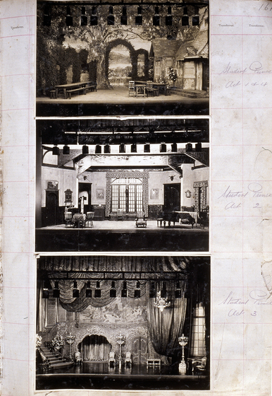 Three black and white photographs of different set designs, stuck to a scrapbook page. There are some hand written notes in the margin.