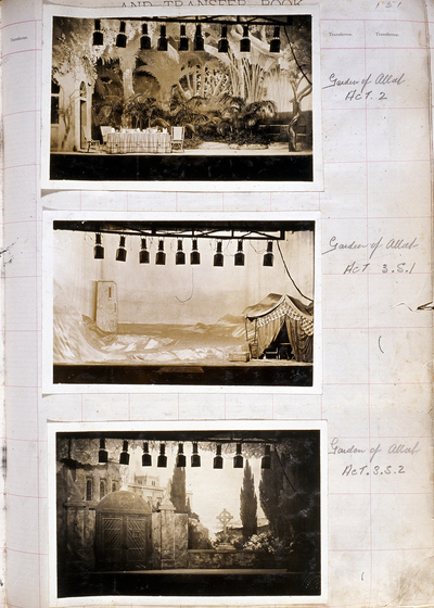 Three sepia photographs of different set designs, stuck to a scrapbook page. There are some hand written notes in the margin.