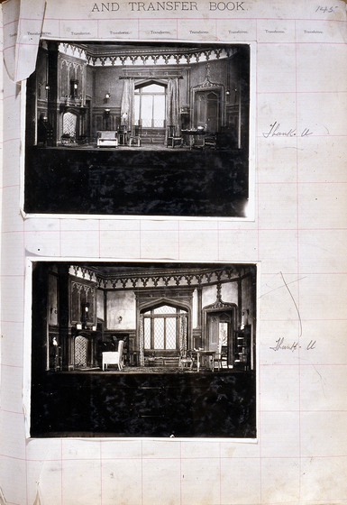 Two black and white photographs of different set designs, stuck to a scrapbook page. There are some hand written notes in the margin.