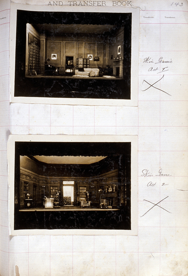 Two sepia photographs of different set designs, stuck to a scrapbook page. There are some hand written notes in the margin.