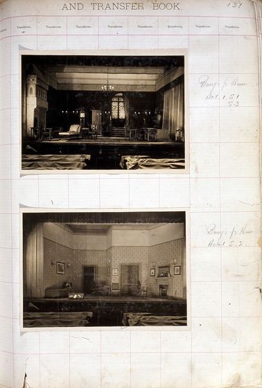 Two sepia photographs of different set designs, stuck to a scrapbook page. There are some hand written notes in the margin.
