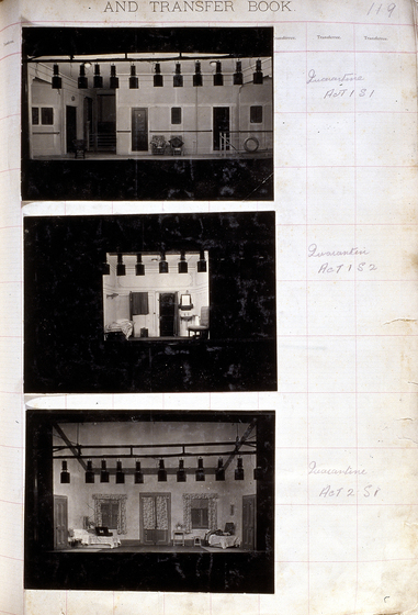 Three black and white photographs of different set designs, stuck to a scrapbook page. There are some hand written notes in the margin.