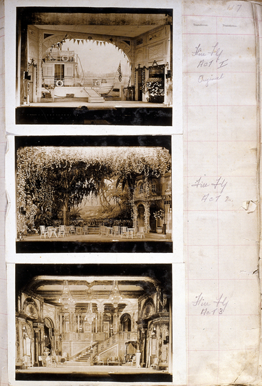 Three sepia photographs of different set designs, stuck to a scrapbook page. There are some hand written notes in the margin.