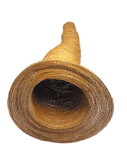 An eel trap woven from grass, with the large round end facing directly to the camera so you can see inside it, and the thin end trailing to the back.