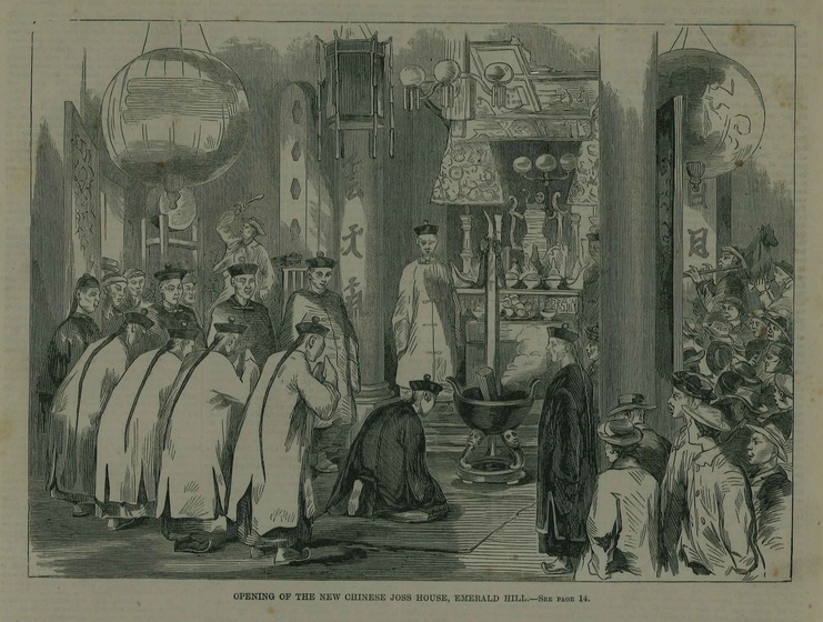 Scene of the inside of a temple, with many Chinese men standing or kneeling in front of a decorative altar. European men and women look on from the sideline, dressed in hats and coats.