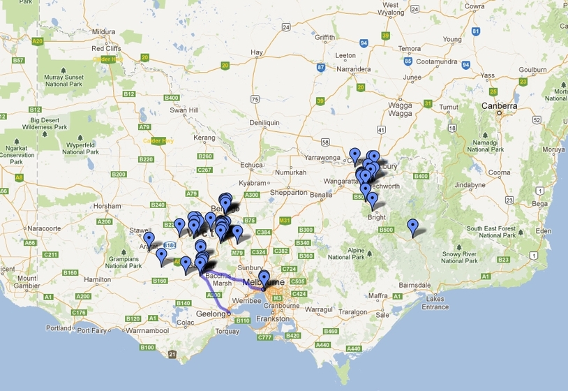 Computer generated map of the state of Victoria with blue pin drop marks in various locations, road lines and green highway numbers.