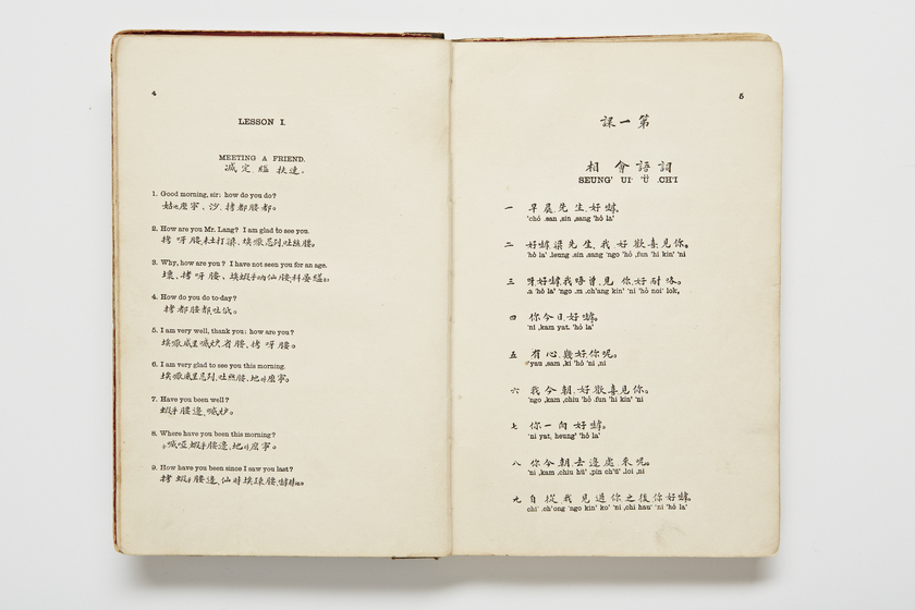 Double page book with Cantonese characters and English translations.