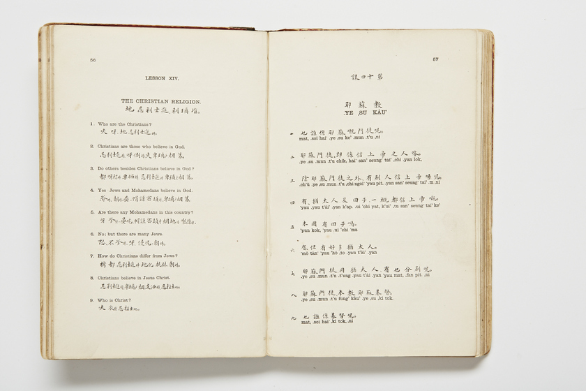Double page book with Cantonese characters and English translations.