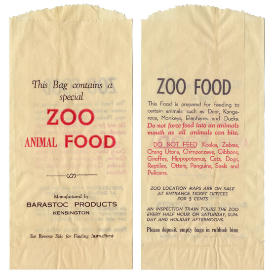 Two paper bags with printed writing on the front describing how to feed the zoo animals appropriately.