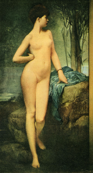 A naked woman stands with one hand on her hip and the resting on a nearby stone. Her face is turned to the side and a painted backdrop of a river and trees stands behind her.