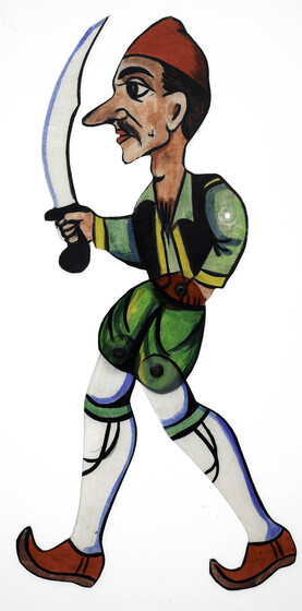Acrylic figure of a man, jointed with pins at the waist and knees. He carries a scimitar style sword, and wears knee high white socks, red pointed shoes, green shorts and a green shirt with black vest and red cap. 