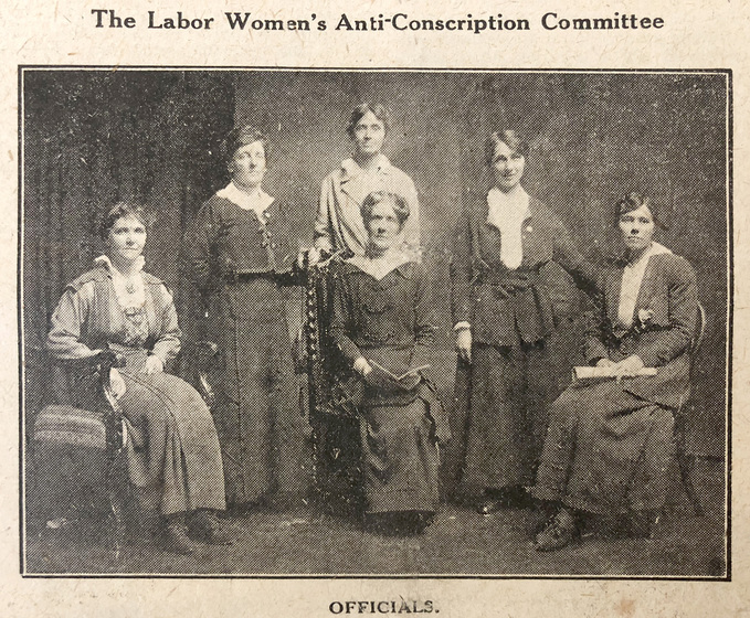 Newspaper clipping of a studio photograph of six women, three seated and three standing, titled "The Labor Women's Anti-Conscription Committee, Officials".