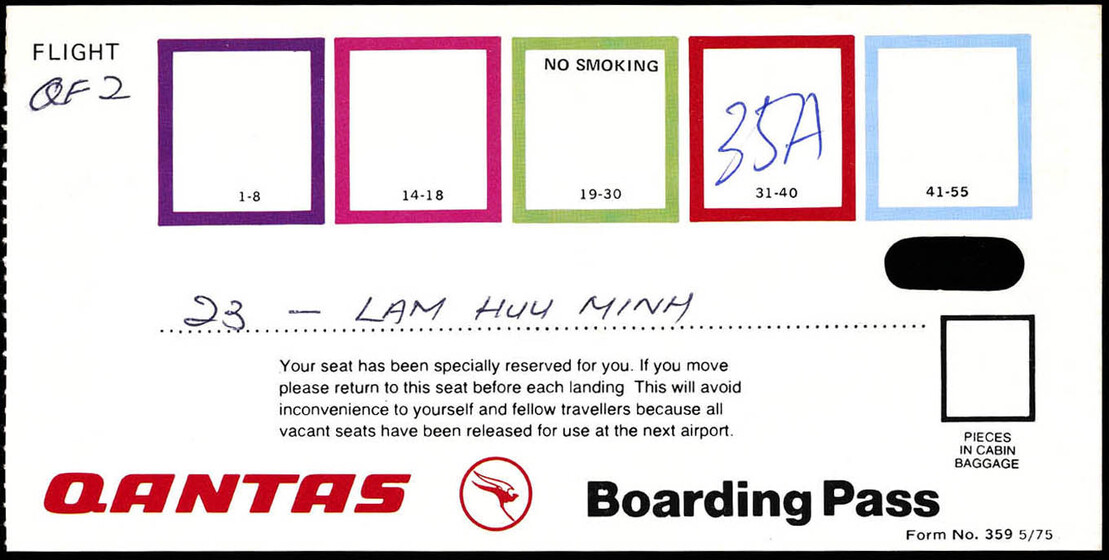 Qantas plane ticket with coloured boxes and 35A written in blue pen in a red box.