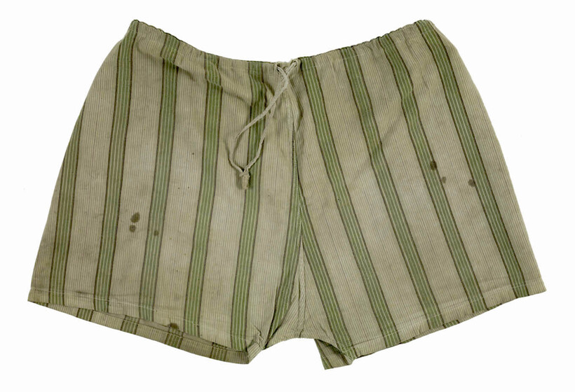 Cream shorts with green stripes