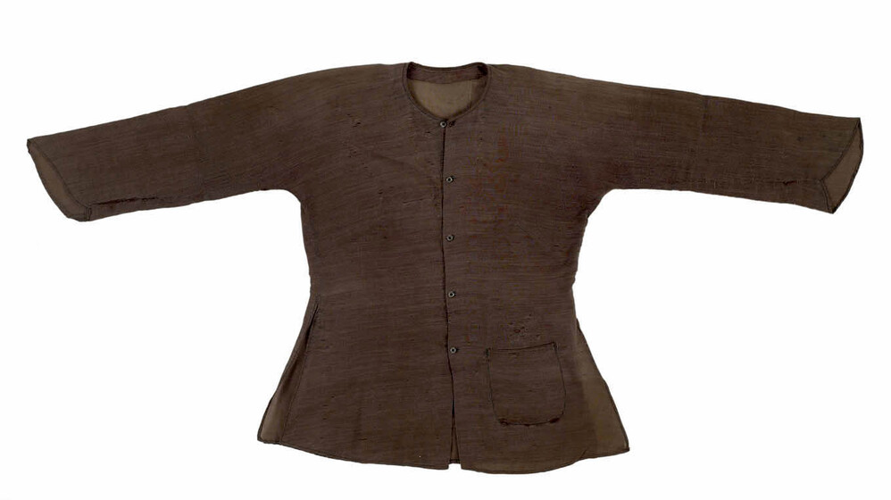 Brown long sleeved button up shirt with pocket on left side at bottom.