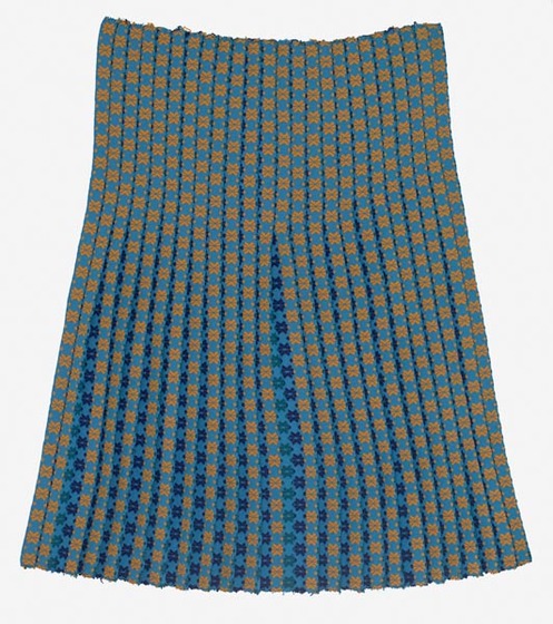 Length of blue and yellow fabric with a tight lined pattern, making repeating squares. 