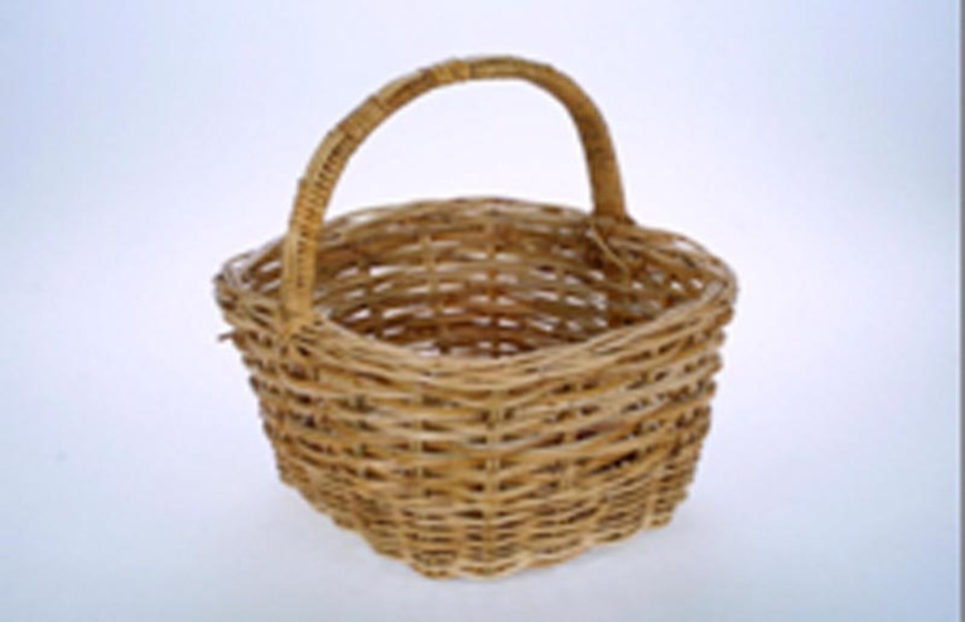 Woven wicker square basket with a handle.