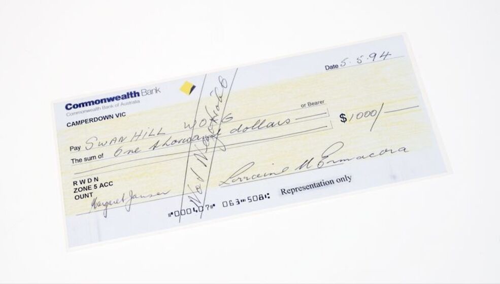 A bank cheque from the Commonwealth Bank made out for one thousand dollars.