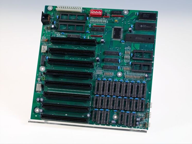 A green computer motherboard.
