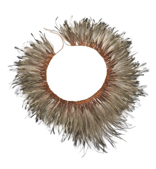 Circular band of leather with multiple emu feathers stitched around.