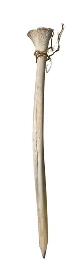 Long thin bone with a point on one end, and a wider end of the other. Around the wider end is tied kangaroo sinew.