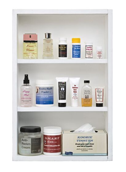 Artwork showing a medicine cabinet full of bottles and containers. The titles on the bottles relate to Koorie health and issues, and include 'Anti-racism cream', 'Koorie tissues', and 'Koorie Health powder'