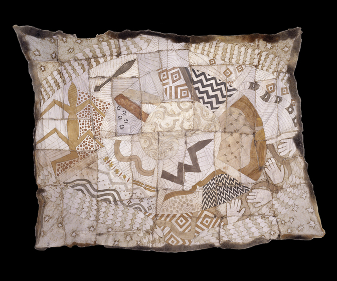 Cloak made with possum skin, stitched together in panels with each featuring a different design. Visible are a geomatric goanna, a club, and four hands.