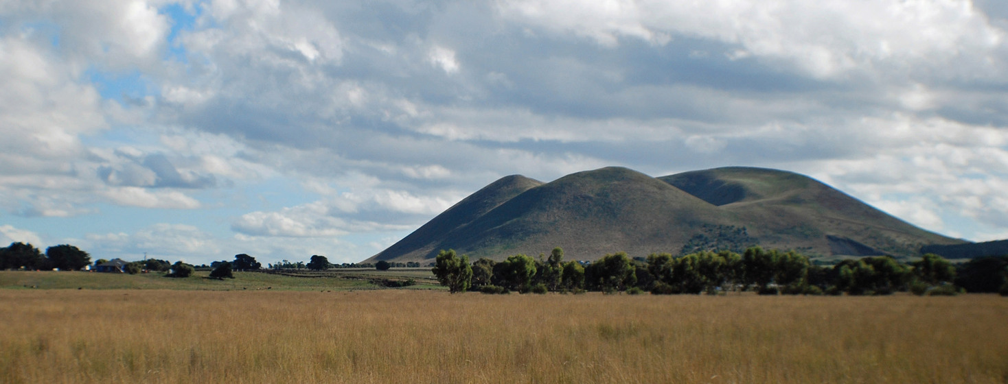 broad grasslands give way to mountains